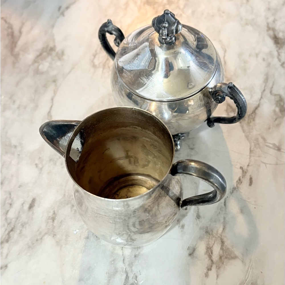 Vintage silver on copper creamer and sugar bowl